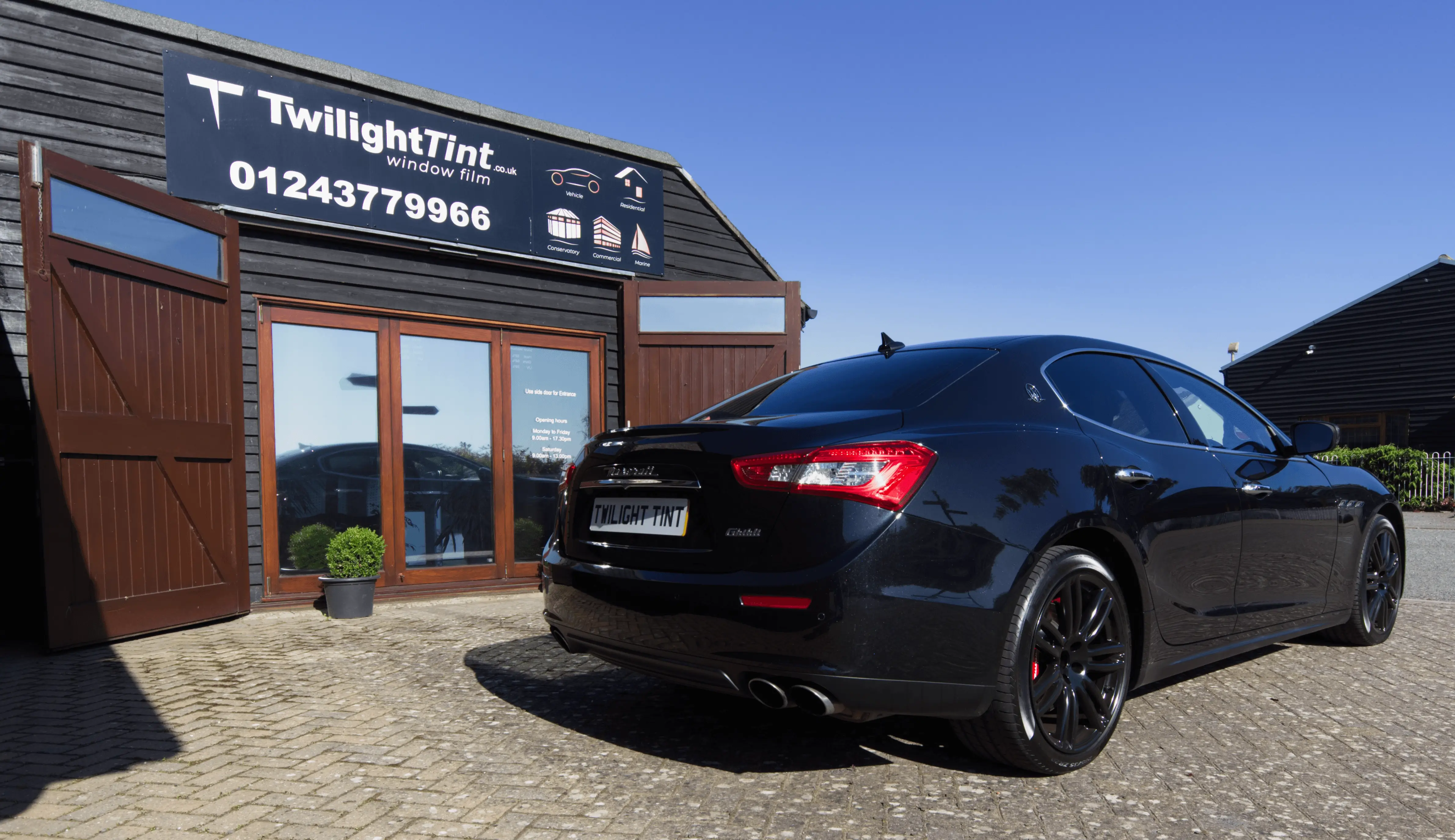 Maserati Ghibli with professionally tinted windows at TwilightTint premises West Sussex